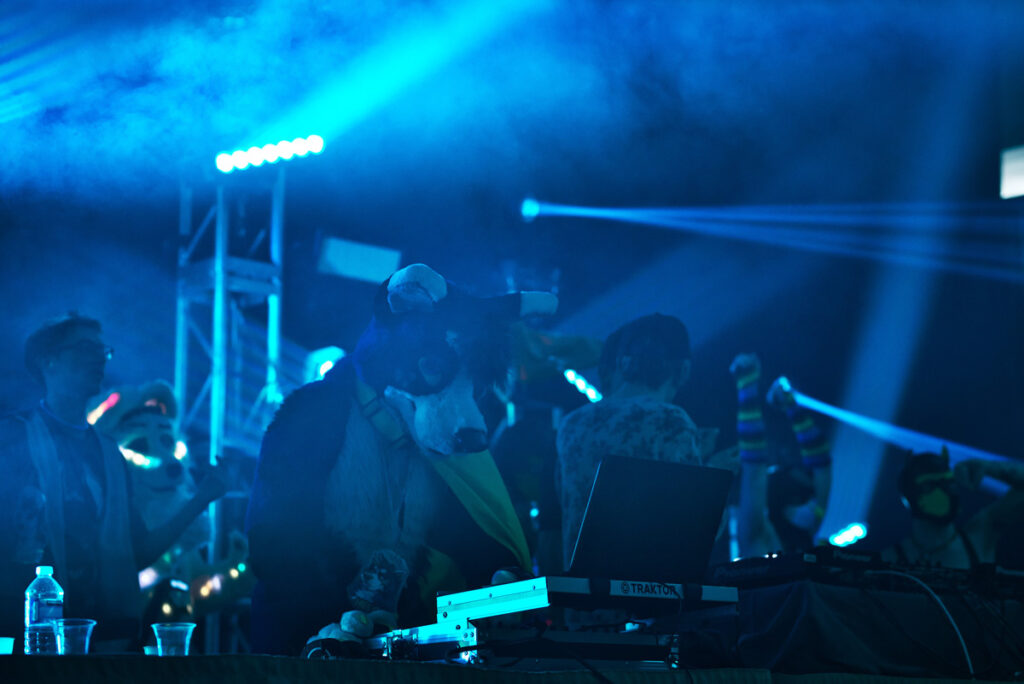 DJ Rahne playing music at a nightly dance at Furnal Equinox 2019