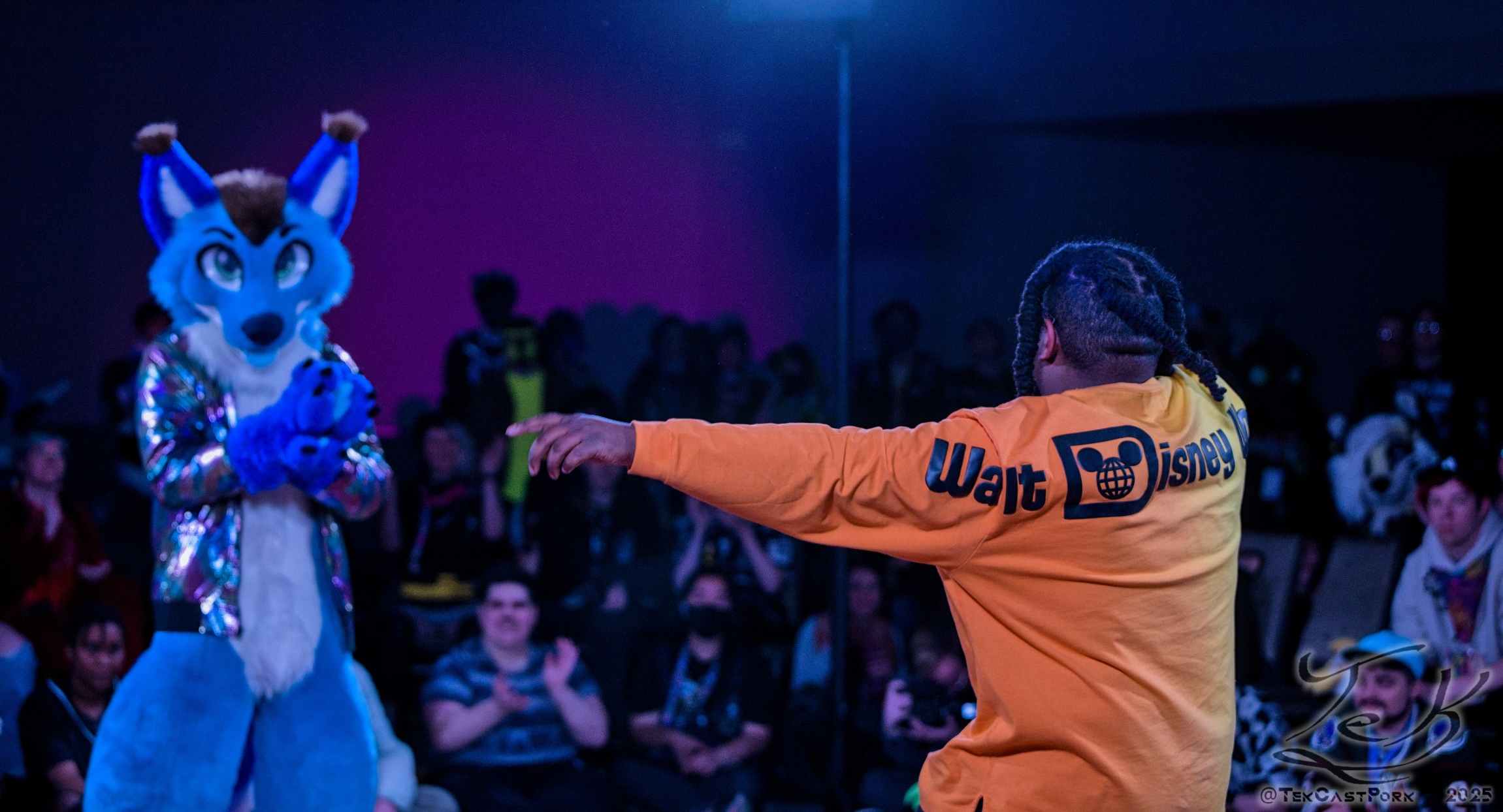 Photo of Zee the Raccoon holding a camcorder, photo taken by Dozing Unicorn